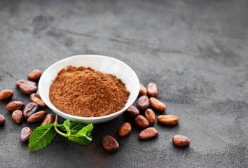 Bowl with Cocoa powder and beans