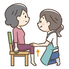 高齢者の椅子を使用した運動　介護士
