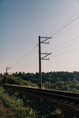 Fototapeta premium Railway track and power line