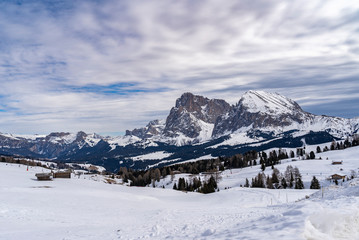 Beautiful winter landscape view from the seiser alm to langkofel and plattkofel mountain in south tyrol