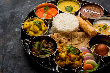 Indian Hindu Veg Thali / food platter, selective focus - obrazy, fototapety, plakaty