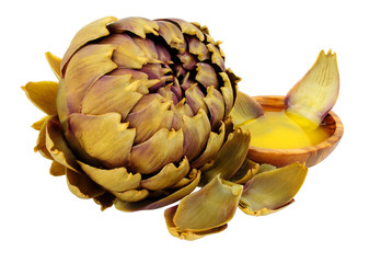 Steamed green globe artichoke flower bud with bowl of melted butter isolated on a white background