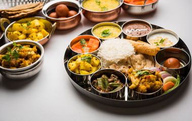 Fototapeta na wymiar Indian Hindu Veg Thali / food platter, selective focus