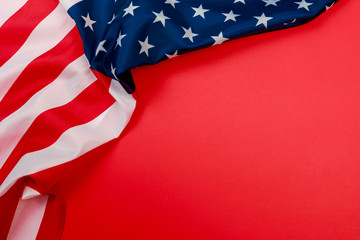 American flag on red background  top view .