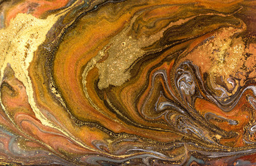 Bronze and gold marbling pattern. Golden marble liquid texture.