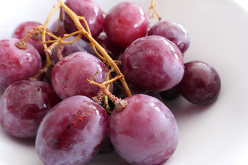 Fresh Red Grapes isolated on a White Background