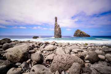 Lava islets in Ribeira da Janela at stony beach - Wild and beautiful coast with rock formations in the ocean near Porto Moniz on the island Madeira, Portugal