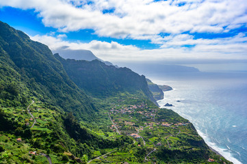 Beautiful landscape scenery of Madeira Island - View of small village Arco de Sao Jorge near Boaventura on the north side of Madeira, Portugal - obrazy, fototapety, plakaty
