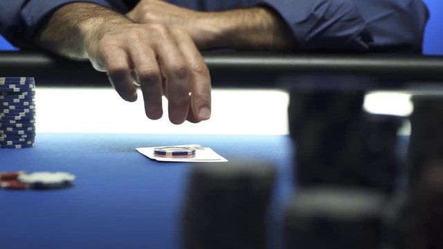 Successful poker player winning at the casino