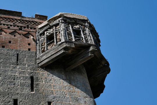 Cantilevered wooden Balcony as watch window on the corner of fortification wall of Sardar Purandare Wada, Saswad, Pune
