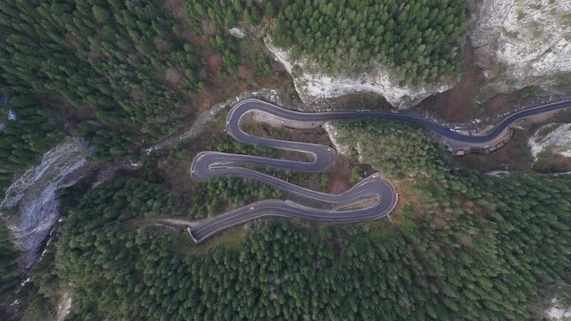 Drone view of winding forest road in the middle of Bicaz Gorge, Transylvania
