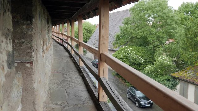 ROTHENBURG OB DER TAUBER, GERMANY - JUNE 12 , 2019: Medieval town wall. Zoom out