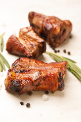 Tasty grilled meat on light background