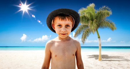 Small boy on beach and summer time 