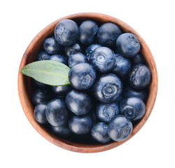 Bowl with ripe blueberry on white background