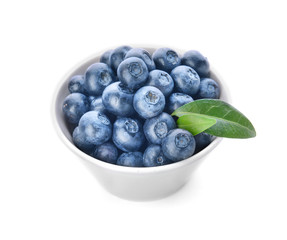 Bowl with ripe blueberry on white background