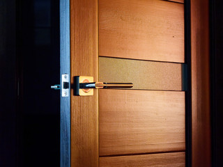 interior wood doors with a metal handle