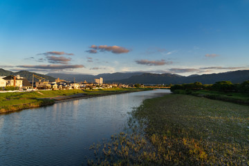 Fototapeta premium Town view with stream in residential area in Fukuoka prefecture, JAPAN