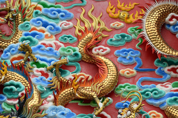Obraz premium Chinese dragon in the wall according to Buddhist temples
