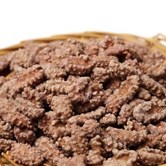 Chocolate nuts on white background