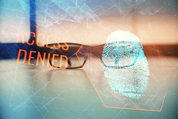 Fingerprint drawing with glasses on the table background. Concept of security. Double exposure.