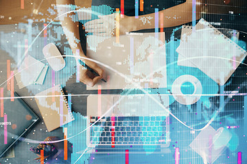 International business hud over woman's hands writing background. Concept of hard work. Double...