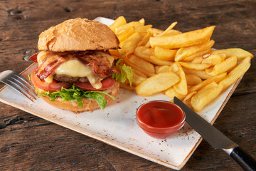 Bacon cheese burger and chips