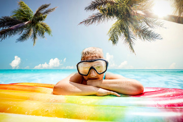 Young girl in sea and summer time 