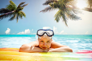 Young girl in sea and summer time 