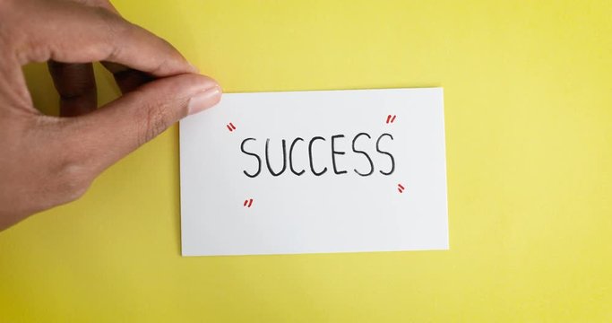 hand flip the paper card of failure to success , motivation for a changing mindset from negative to positive concept