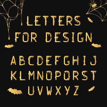 Golden grunge Halloween letters with splatters for october night party. Gold ink typeface for creepy flyer. Dirty lettering font. Vector hand written alphabet.