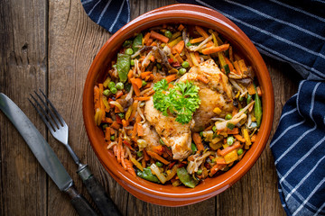 Fried chicken fillet with vegetables.