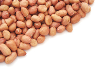 Raw peanuts isolated on white background