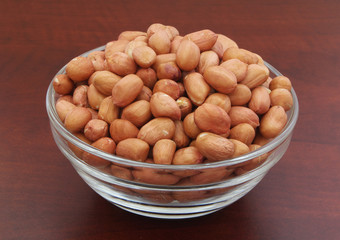Peanuts in bowl close up