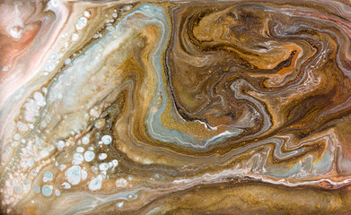 Bronze and gold marbling pattern. Golden marble liquid texture.