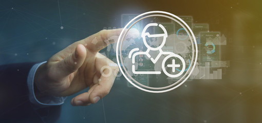 Businessman holding new contact icon