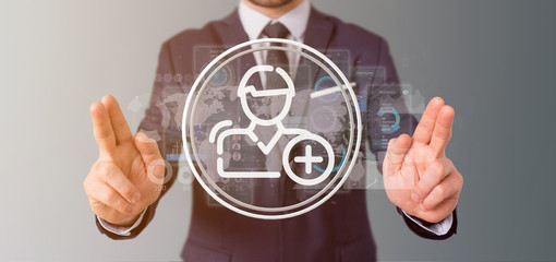 Businessman holding new contact icon
