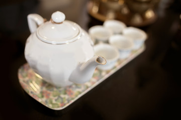 Set of teapot and cup of tea