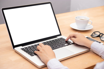 businesswoman working with notebook laptop computer, using finger with keyboard for typing. computer laptop with blank white screen for copy space