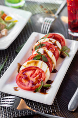 Salad with tomatoes and mozzarella cheese