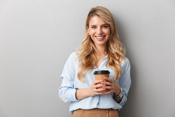 Attractive young blonde businesswoman wearing shirt