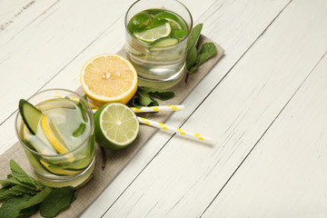 Fresh detox lemon water, healthy drink. Summer citrus lemonade.