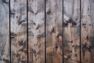 Natural dark brown rustic wooden texture for background. Wood planks backdrop