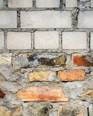 White yellow and red brick wall