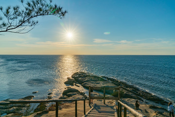 the Tip of Borneo as sun drops to horizon.