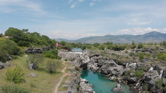 Montenegro, Turquoise clean clear river cijevna near podgorica at niagara falls flowing through beautiful green rocky nature landscape