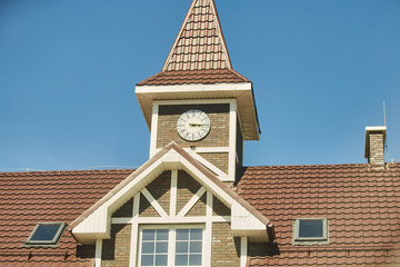 Obraz premium Tower of the old house with a clock. Kaliningrad region.