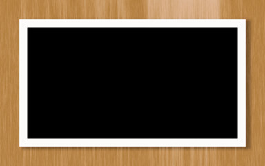 white frame with black space and wooden textured background