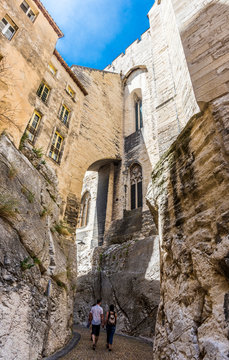 France, Vaucluse, Avignon, Palais des Papes built on rock and alley (UNESCO World Heritage)