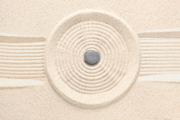 zen ston on raked sand with copy space for your text